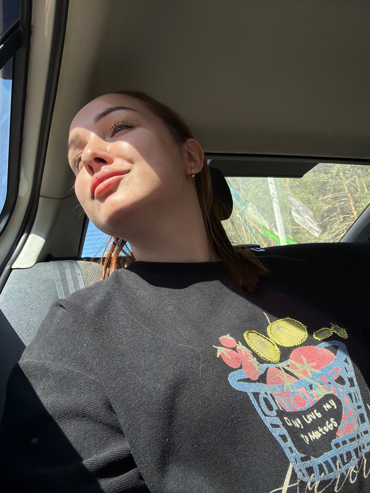 Woman travels through Chaikovsky in morning sunlight