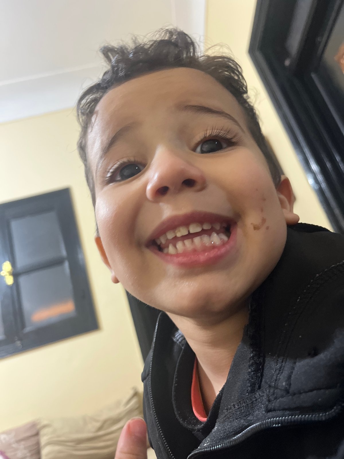 Child photographed from multiple angles in Ouaouizert, Morocco