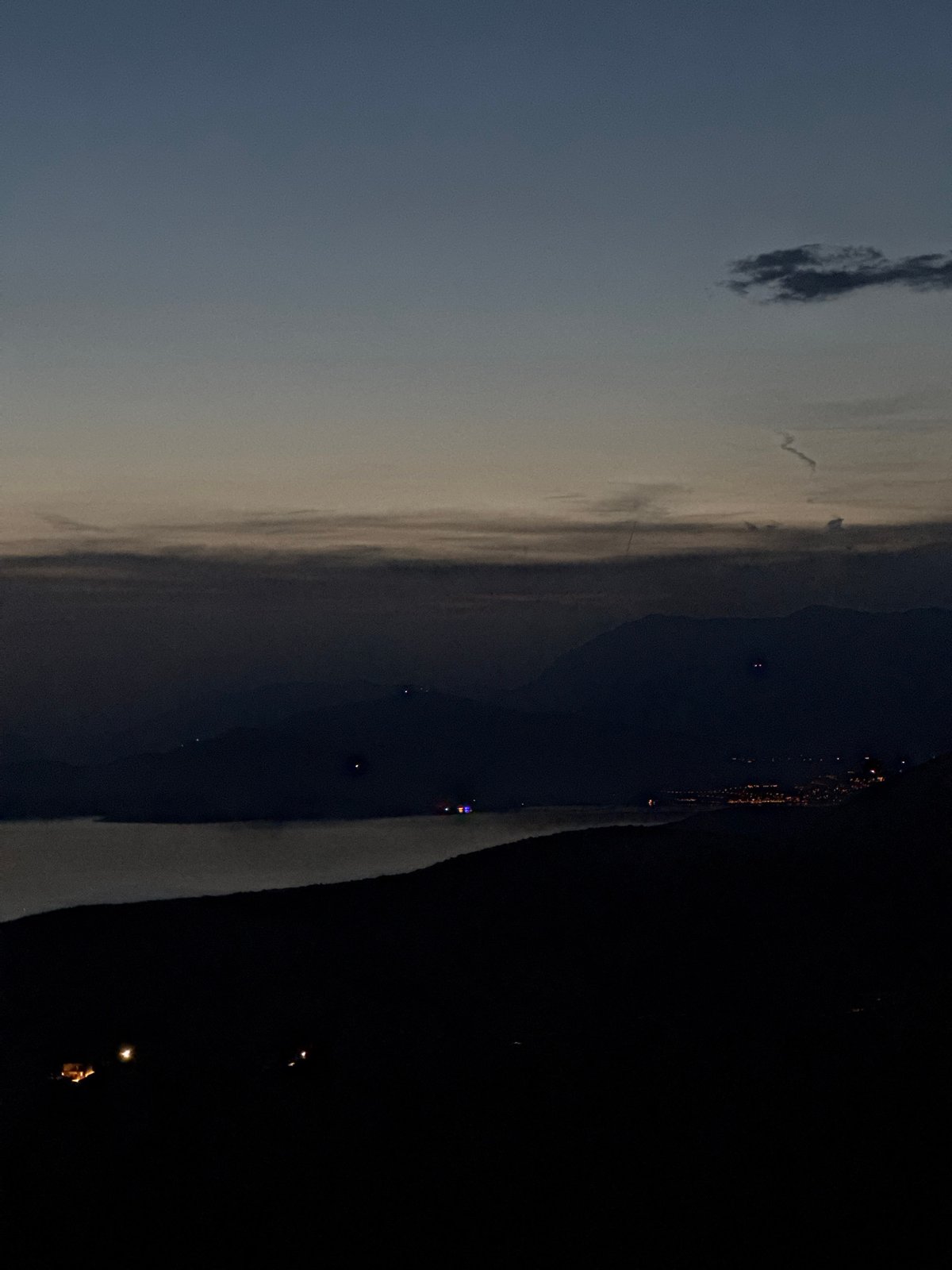 Twilight documented in Kovačko Polje, Montenegro shows churches and starlit sky