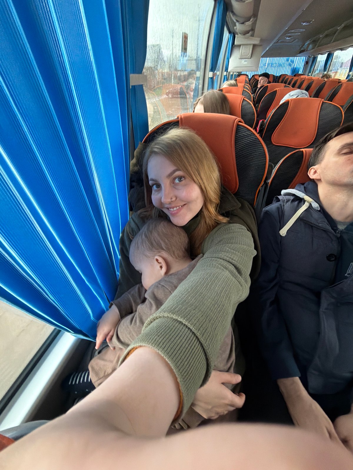 Woman and child observed on bus in Кварса, Russia