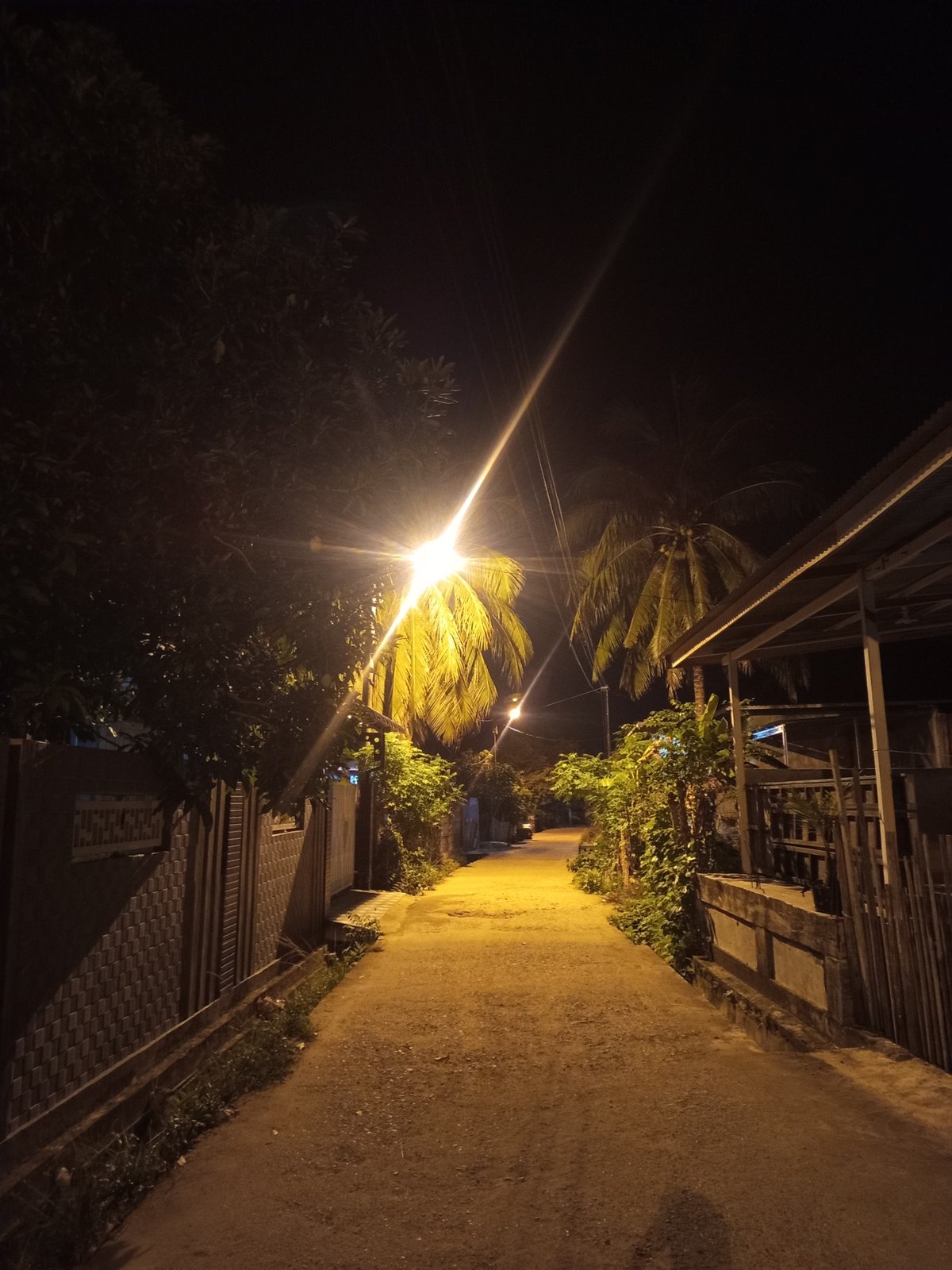 Quiet nighttime street scene documented in Lhokseumawe, Indonesia