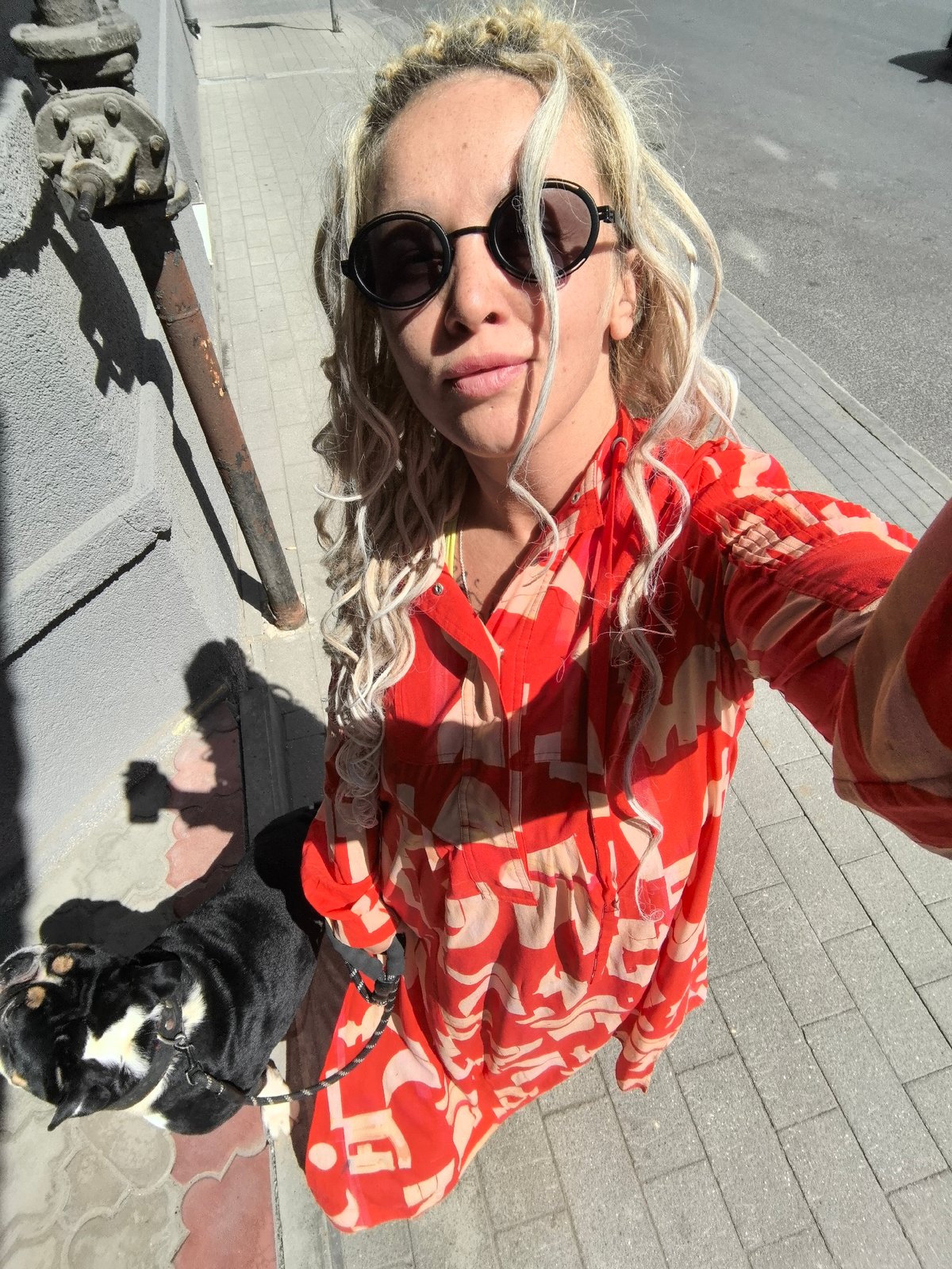Outdoor selfie with a black dog in Nizhny Novgorod