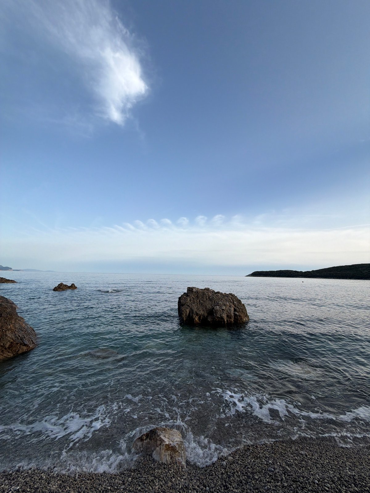 Couple documents afternoon coastal visit in Prijevor, Montenegro