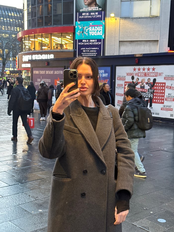 Tourist captures central London landmarks during afternoon stroll