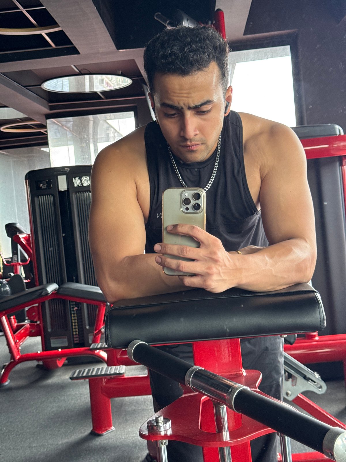 Gym workout session documented across exercises and selfies in Kolkata