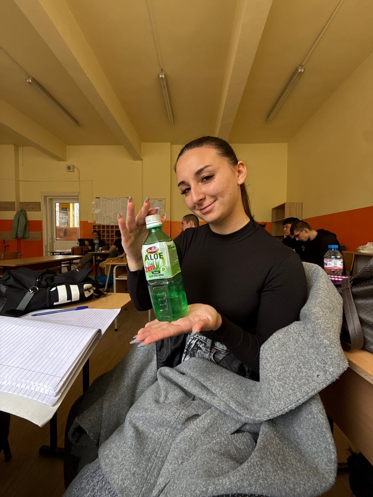 Student displays aloe drinks in Sofia classroom Tuesday morning