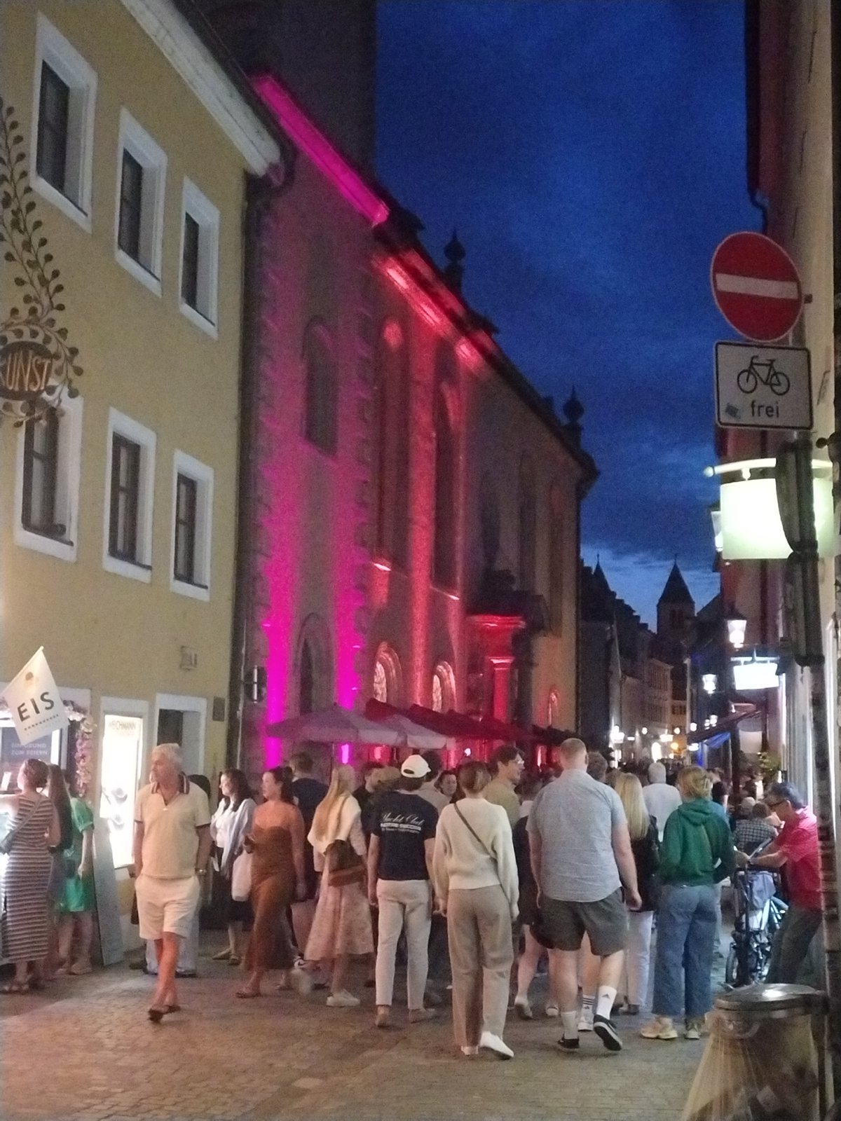 Summer evening crowds around Regensburg Cathedral's old town
