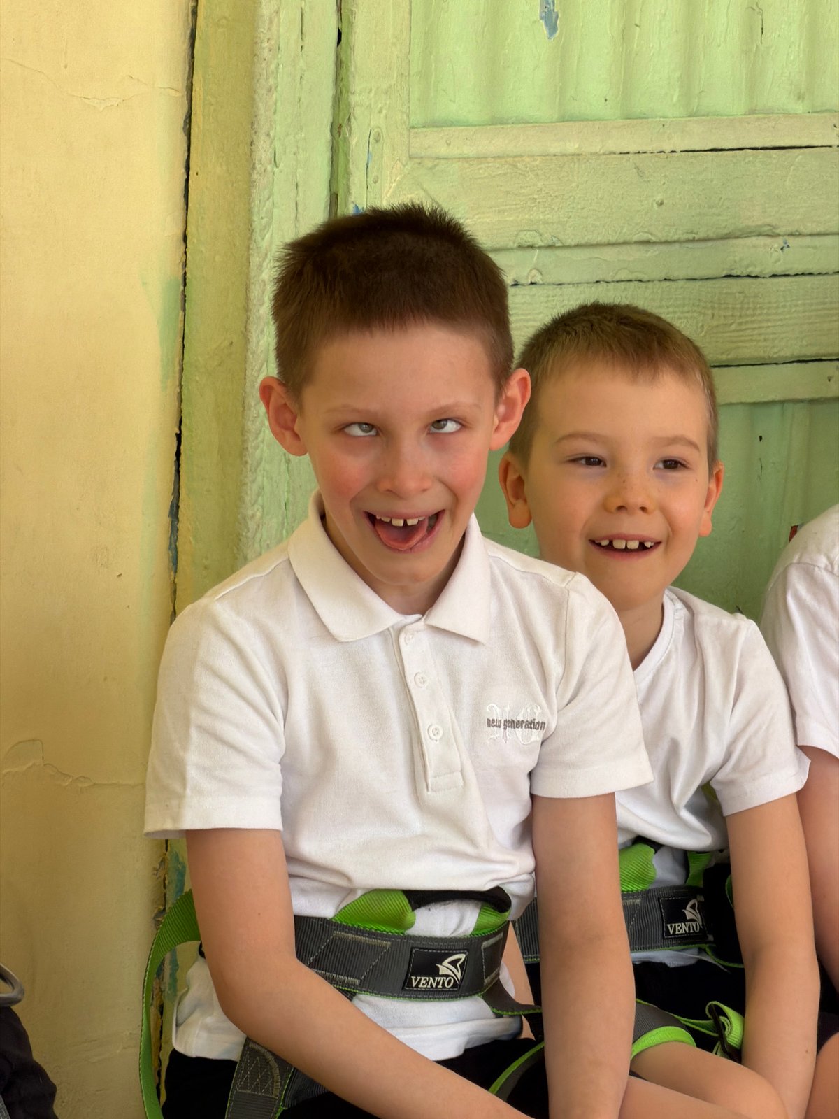 Children participate in indoor rock climbing activity in Izhevsk