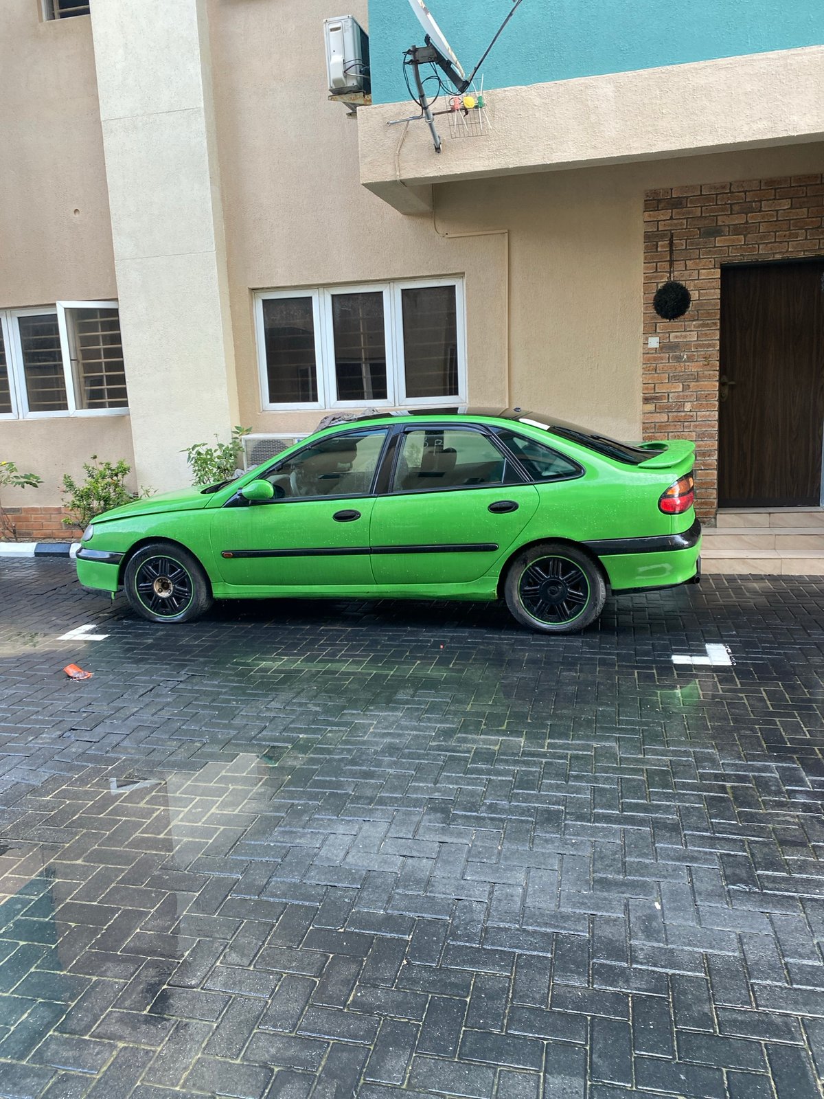 Post-rainfall street scenes documented across Nigerian neighborhoods
