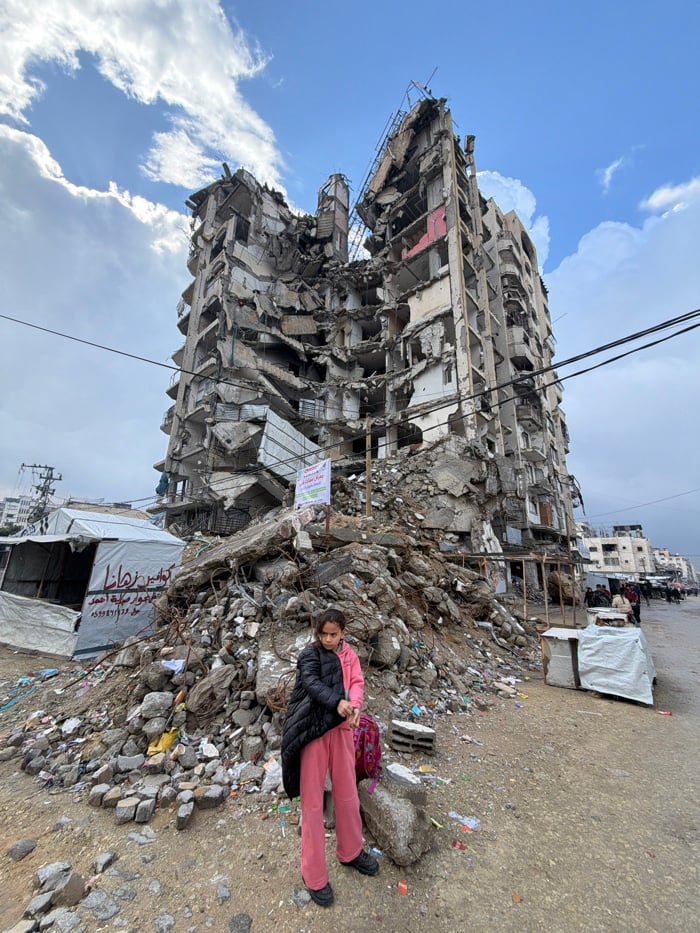 Children navigate daily life amid urban destruction in Gaza