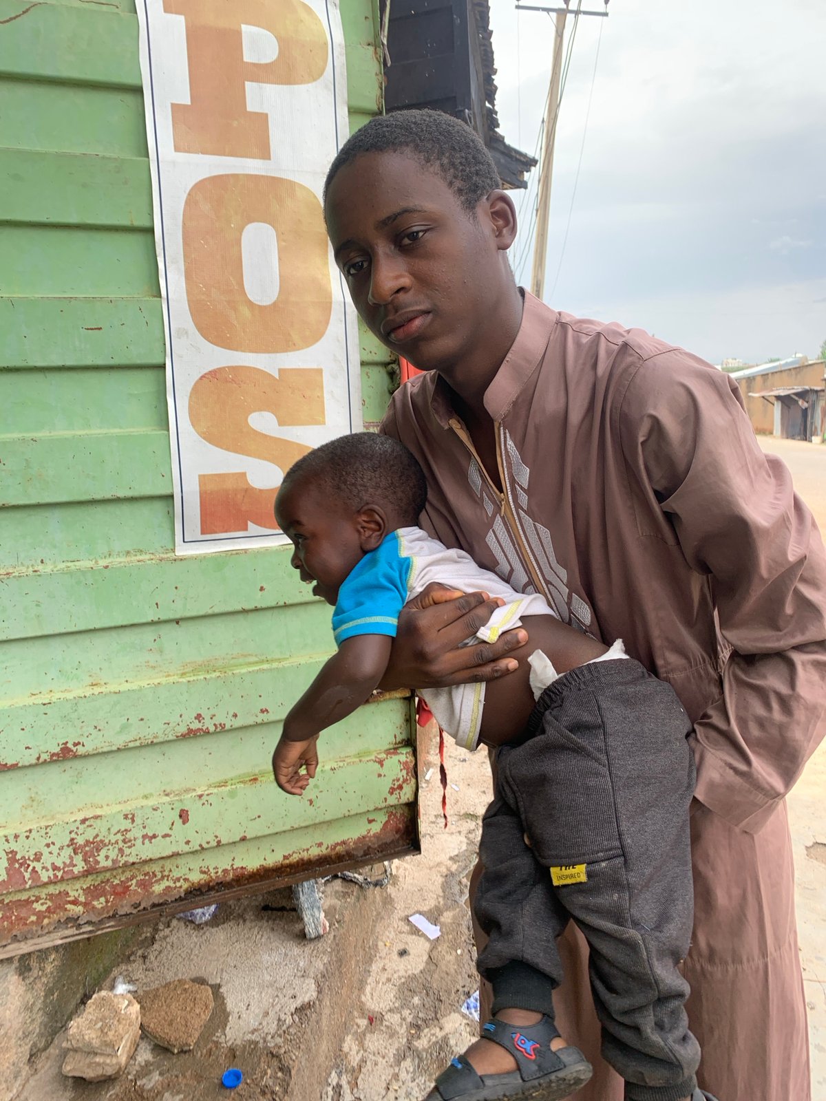 Everyday Jos: street life, a rocky-outcrop shoot, and city scenes