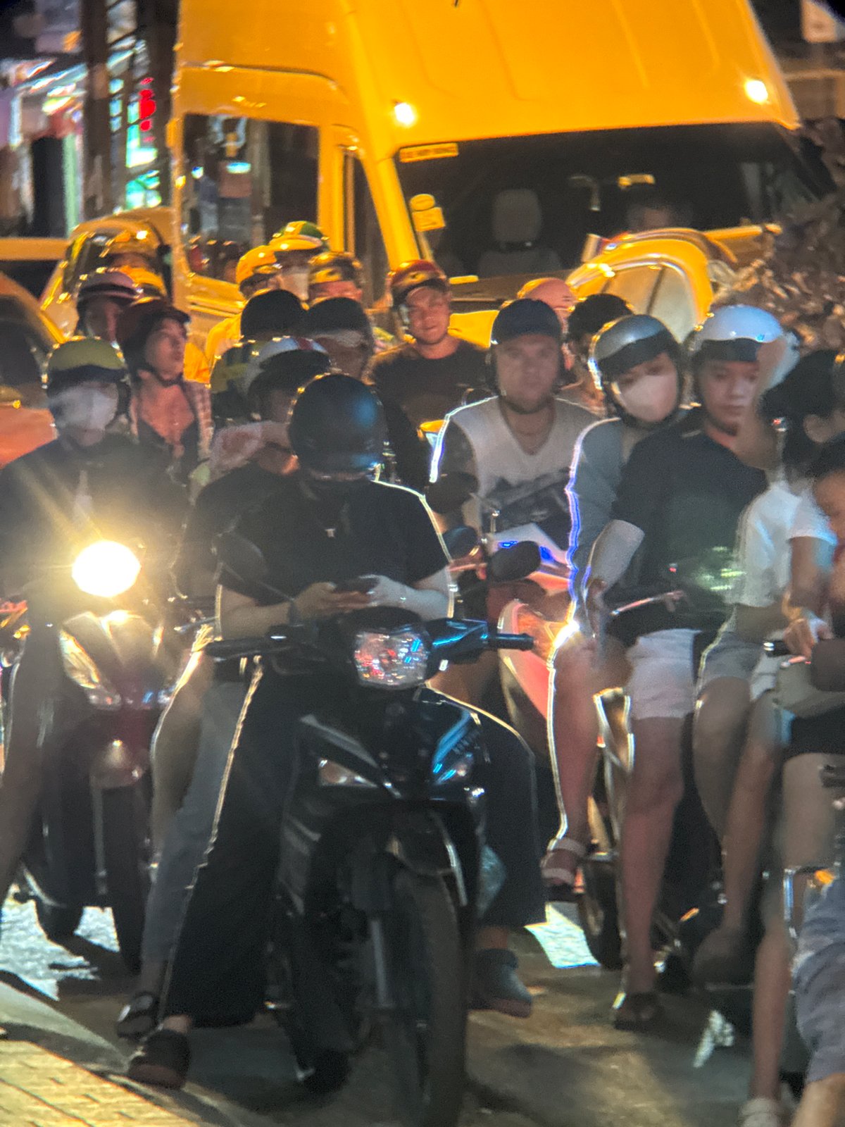 Nha Trang railway crossing backs up motorcycle traffic at night
