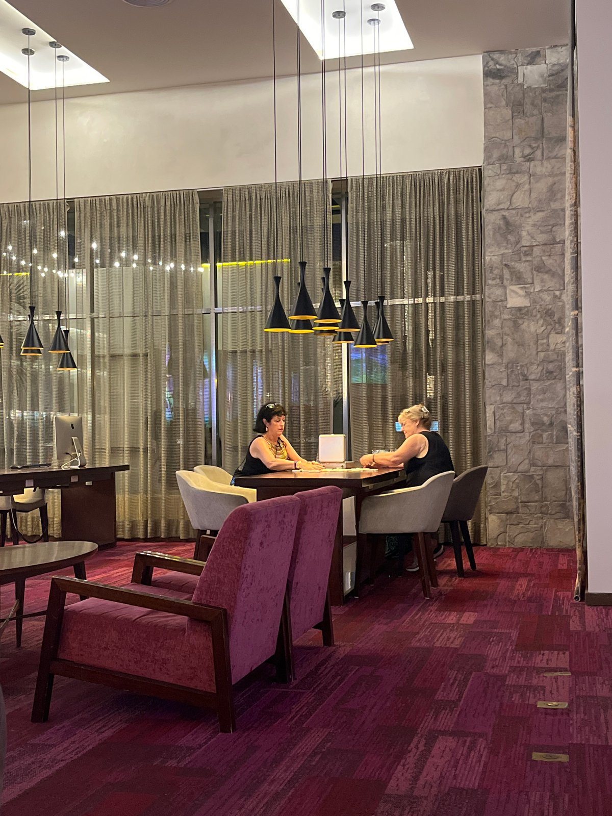 Women at buffet in Playa del Carmen restaurant