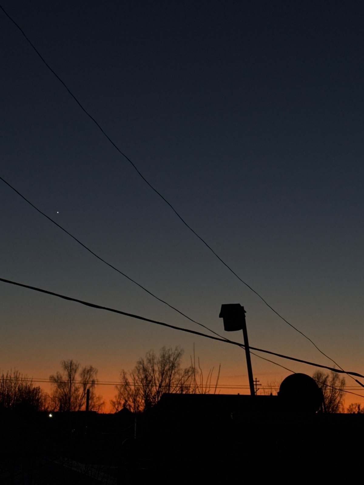 Twilight falls over Фоки, Russia with colorful evening sky