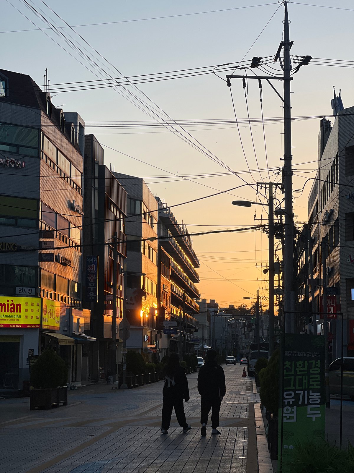 Woman takes street selfies in Daegu, South Korea