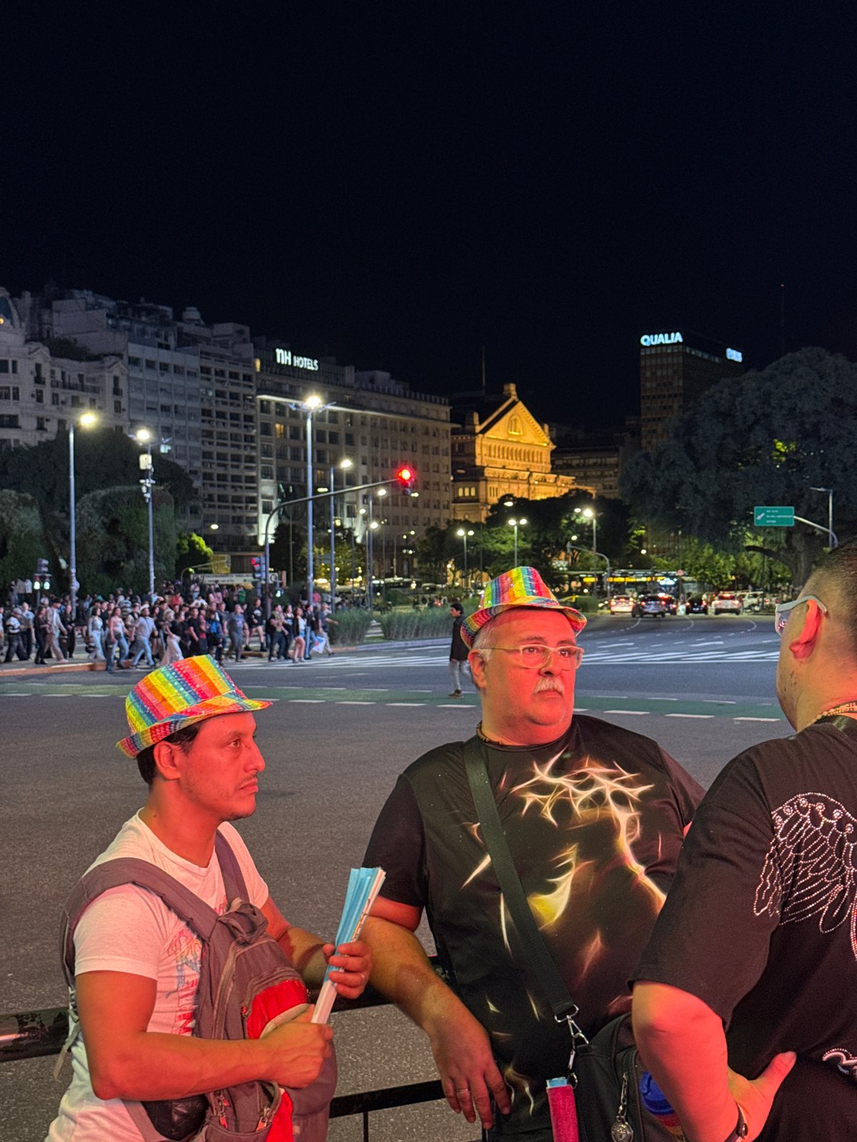 Nighttime crowd gathers near Buenos Aires Obelisco, Spider-Man spotted