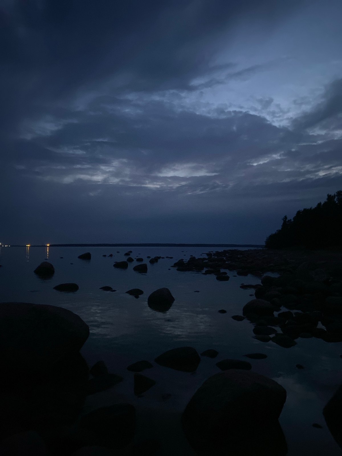 Dusk settles over Gulf of Finland's rocky Yermilovo shore