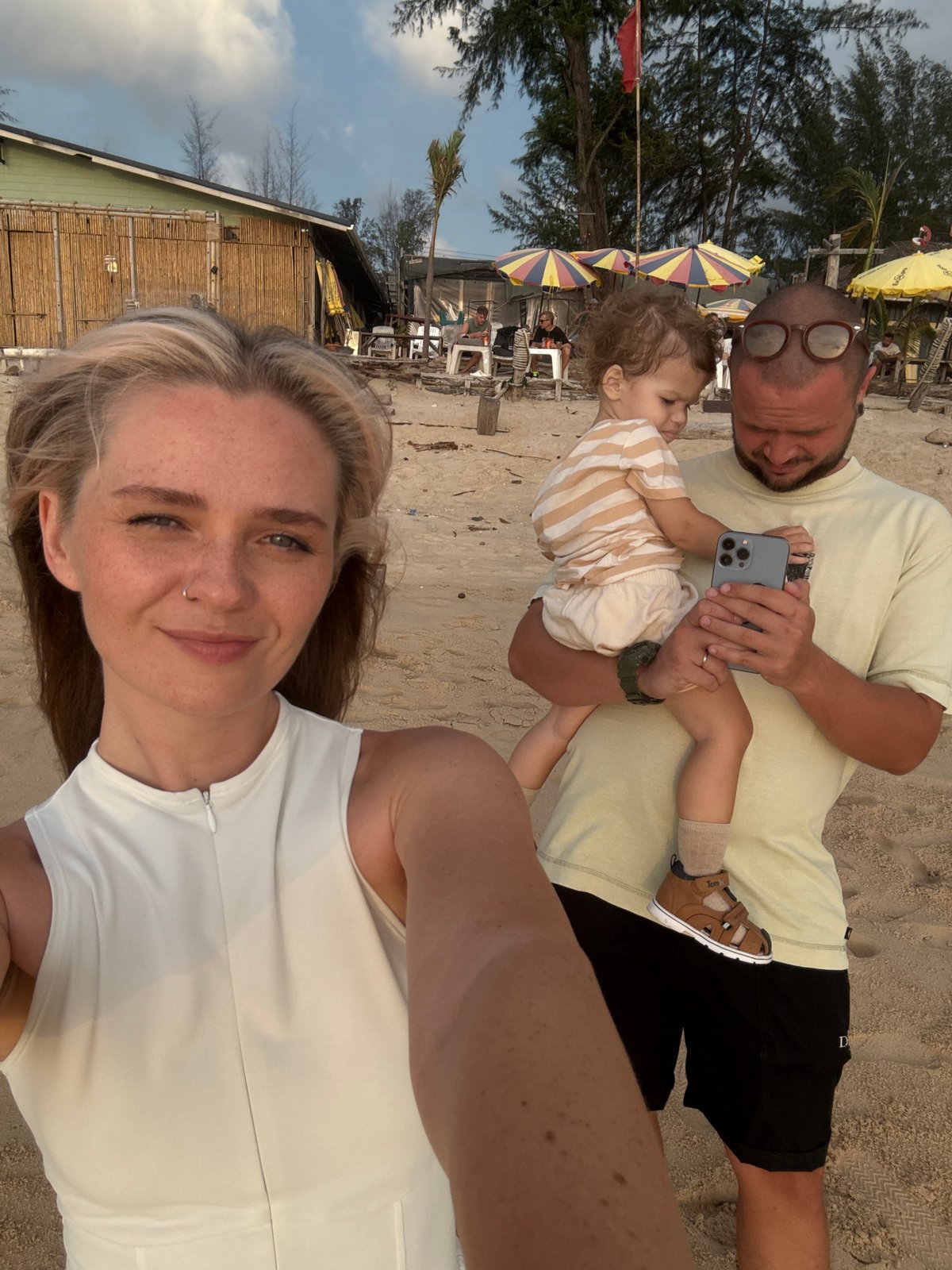 Family beach afternoon at Bang Tao, Phuket, with kites and sunsets