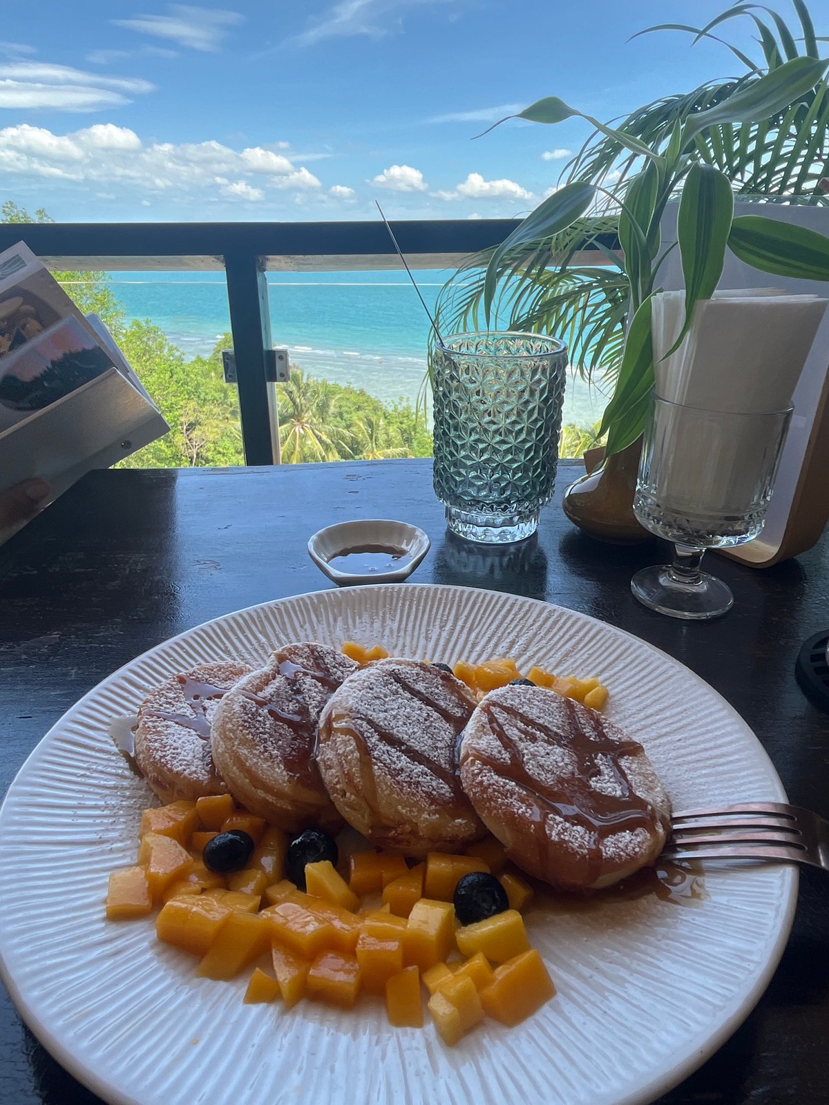 Morning coastal dining experience documented in Ban Tai, Thailand