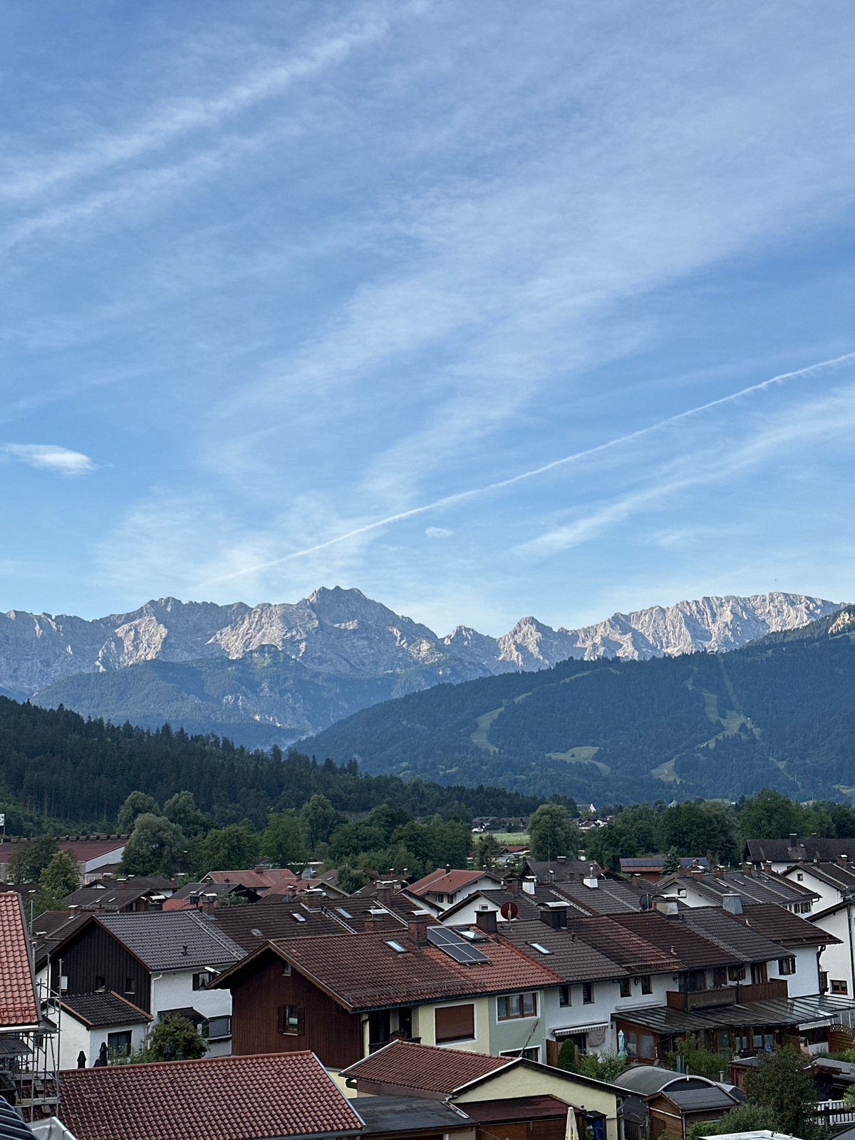 Alpine morning in Garmisch-Partenkirchen, coffee, views, and lawn work