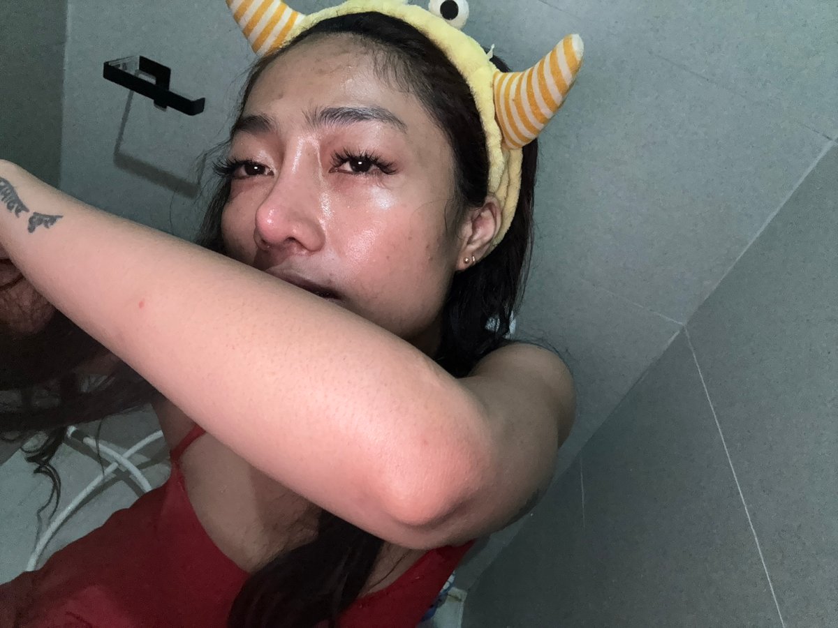 Person observed lying on tiled floor, circumstances unknown