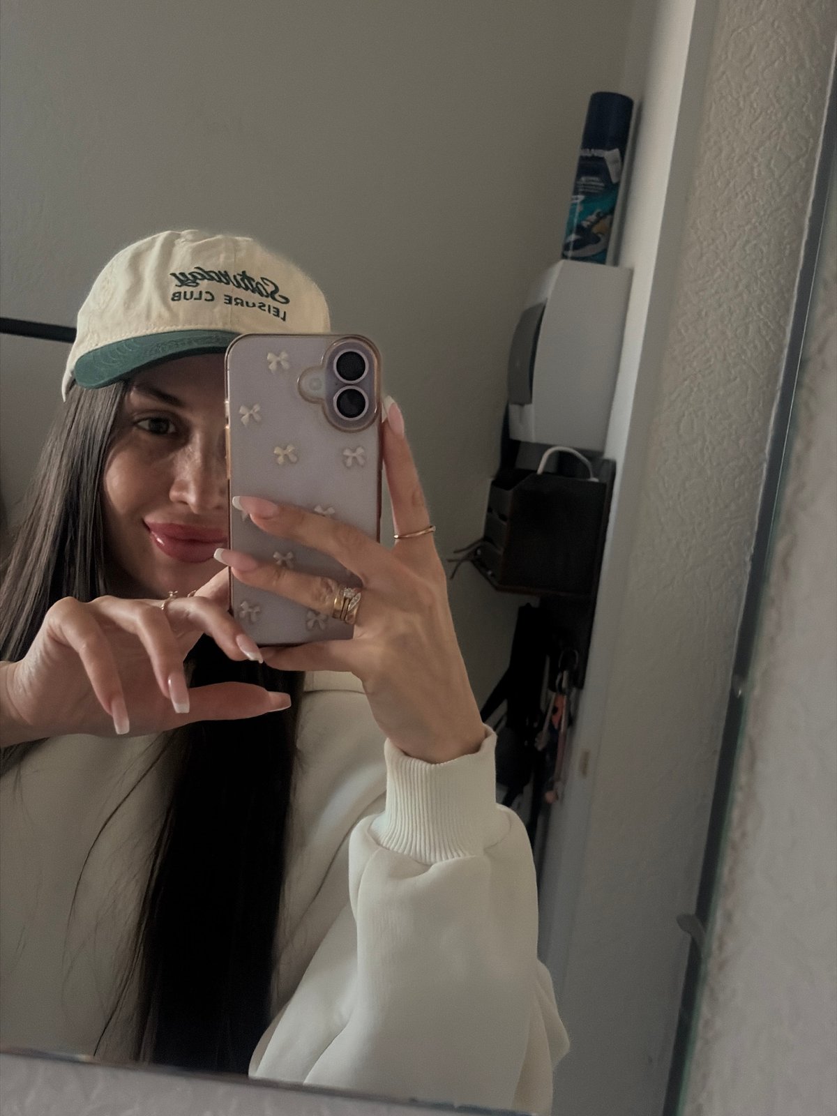 Woman Takes Multiple Mirror Selfies in Saint Petersburg