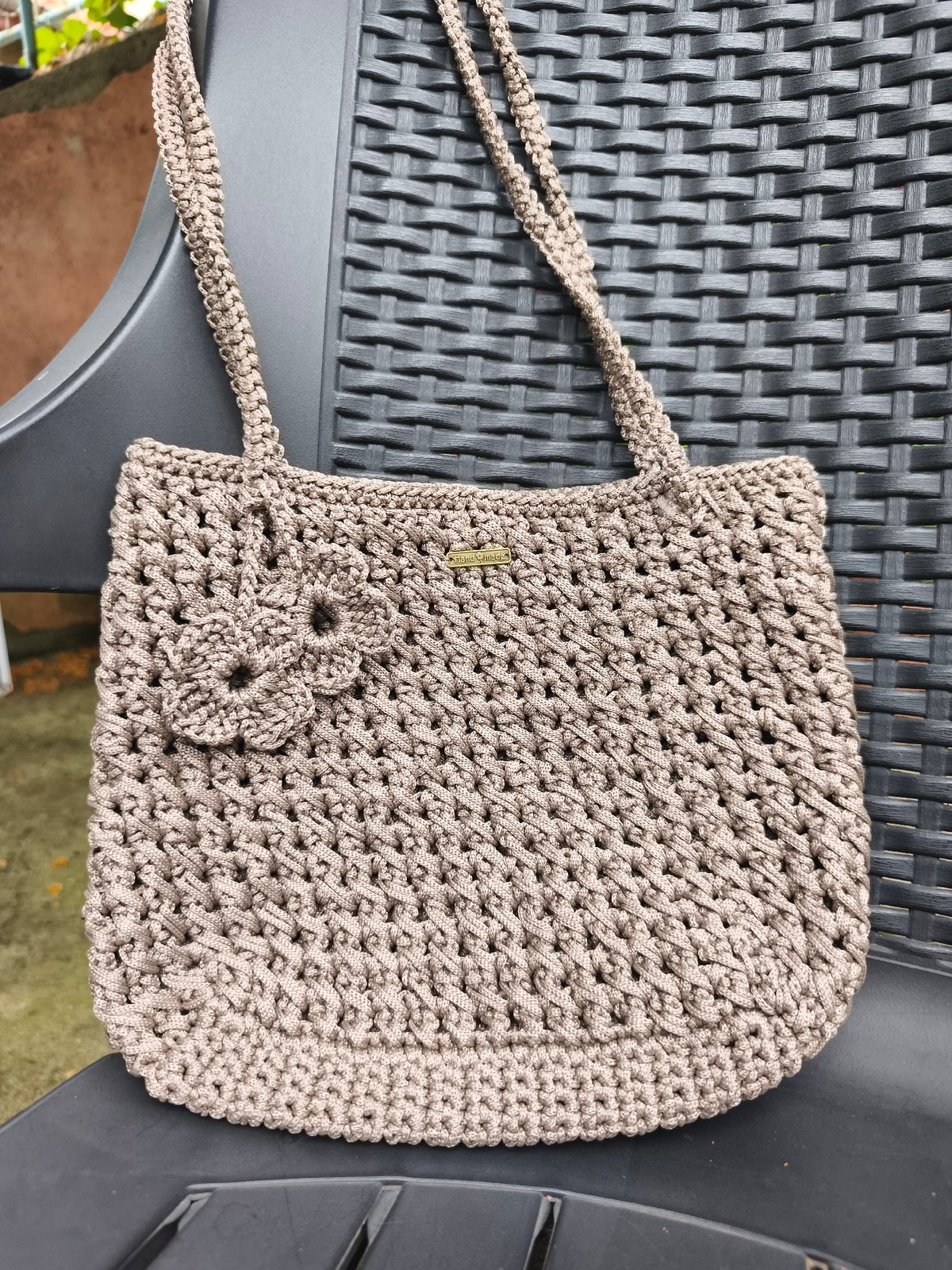 Handmade crocheted handbags displayed in Marinka, Bulgaria