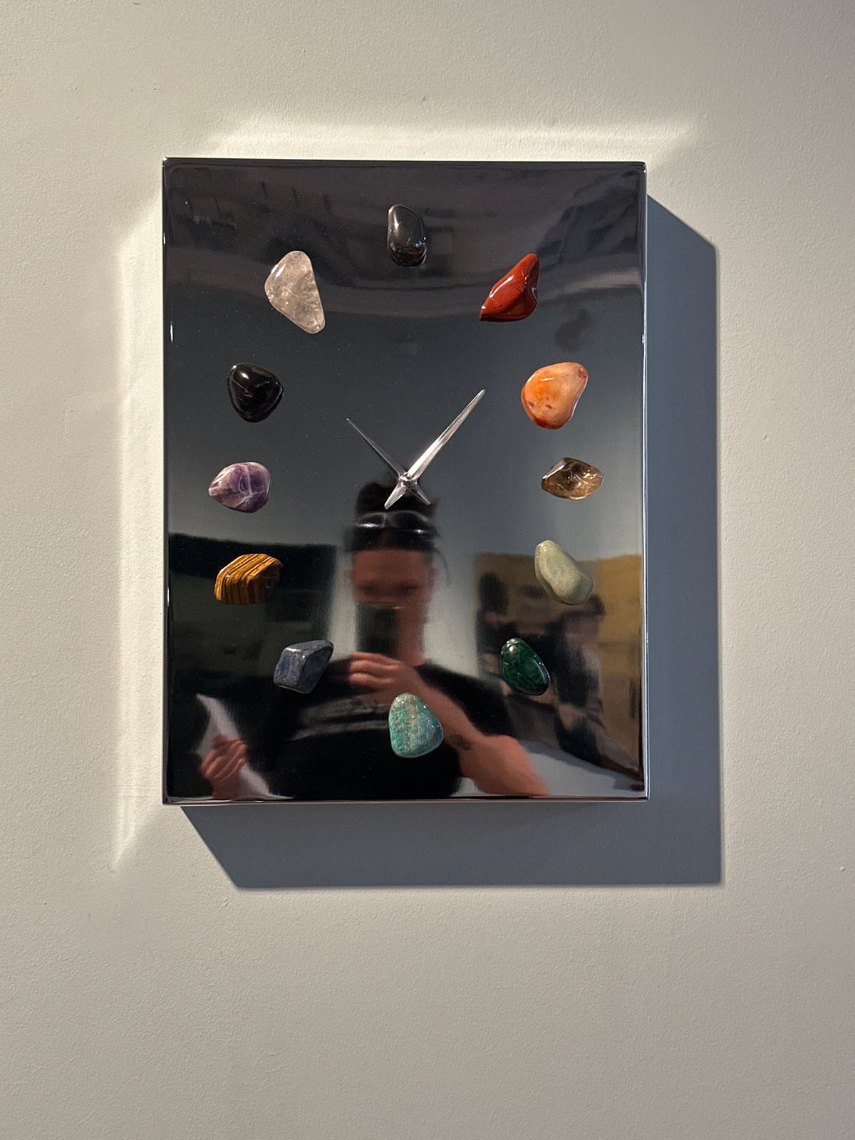Art gallery visitors document diverse installations in London exhibition space