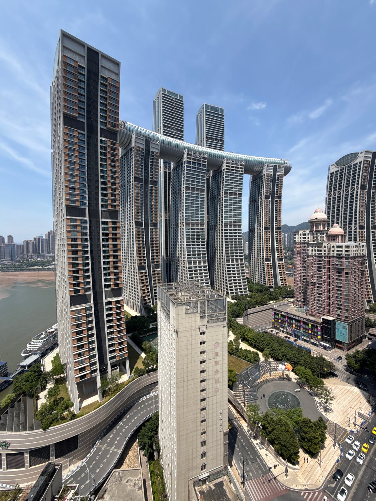 Raffles City Chongqing shot from multiple angles above the Yangtze