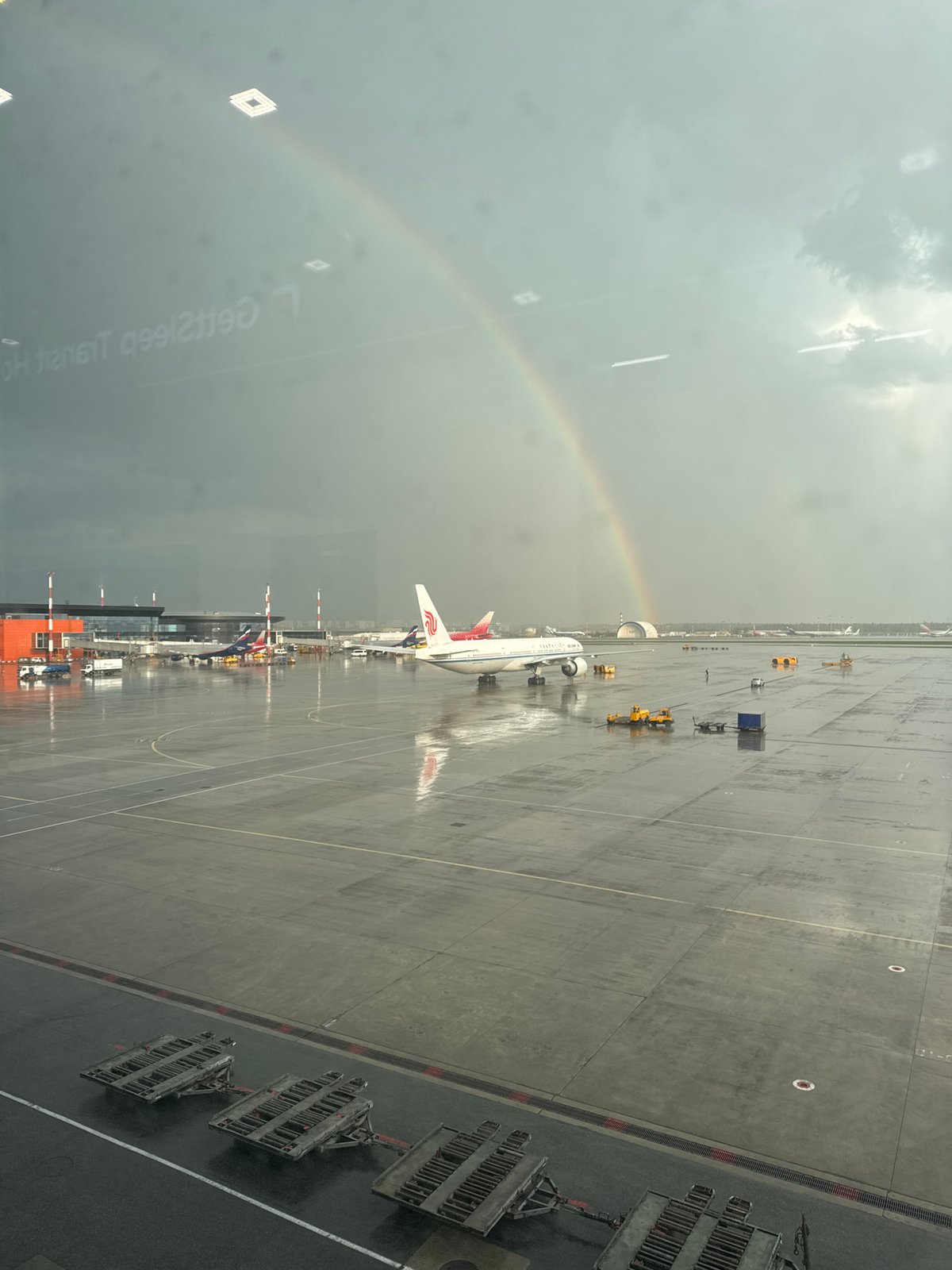 Rainbow appears over storm clouds at Moscow's Sheremetyevo Airport