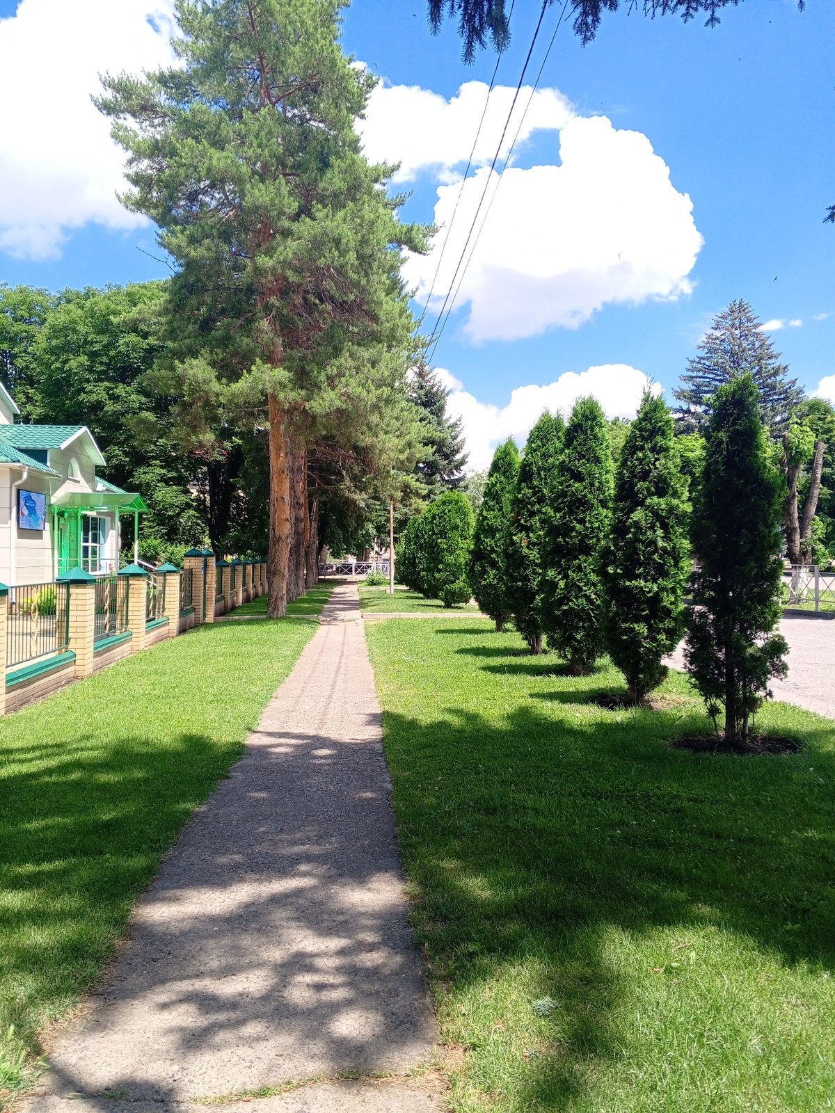 Summer morning in a Russian town square and park