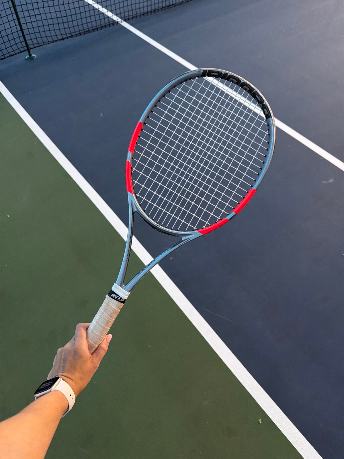 Tennis session captured at indoor court in Podolsk, Russia