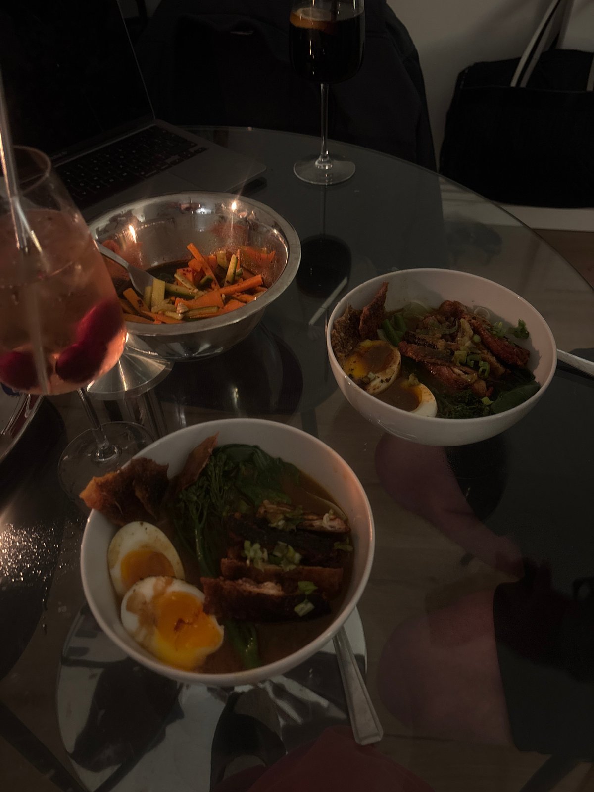 London resident documents ramen dinner with vegetables and wine