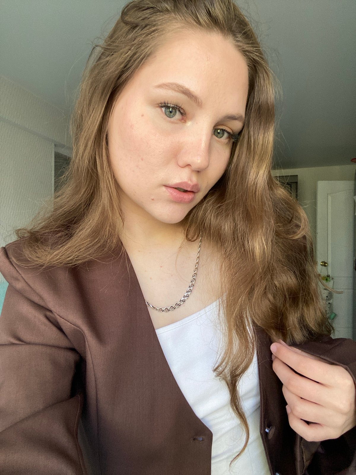 Woman Takes Selfies in Room in Izhevsk, Russia