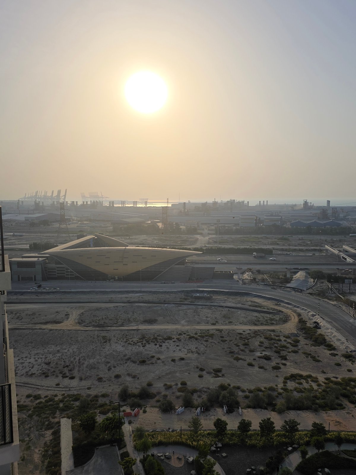 Coffee and skyline views over Dubai at golden hour