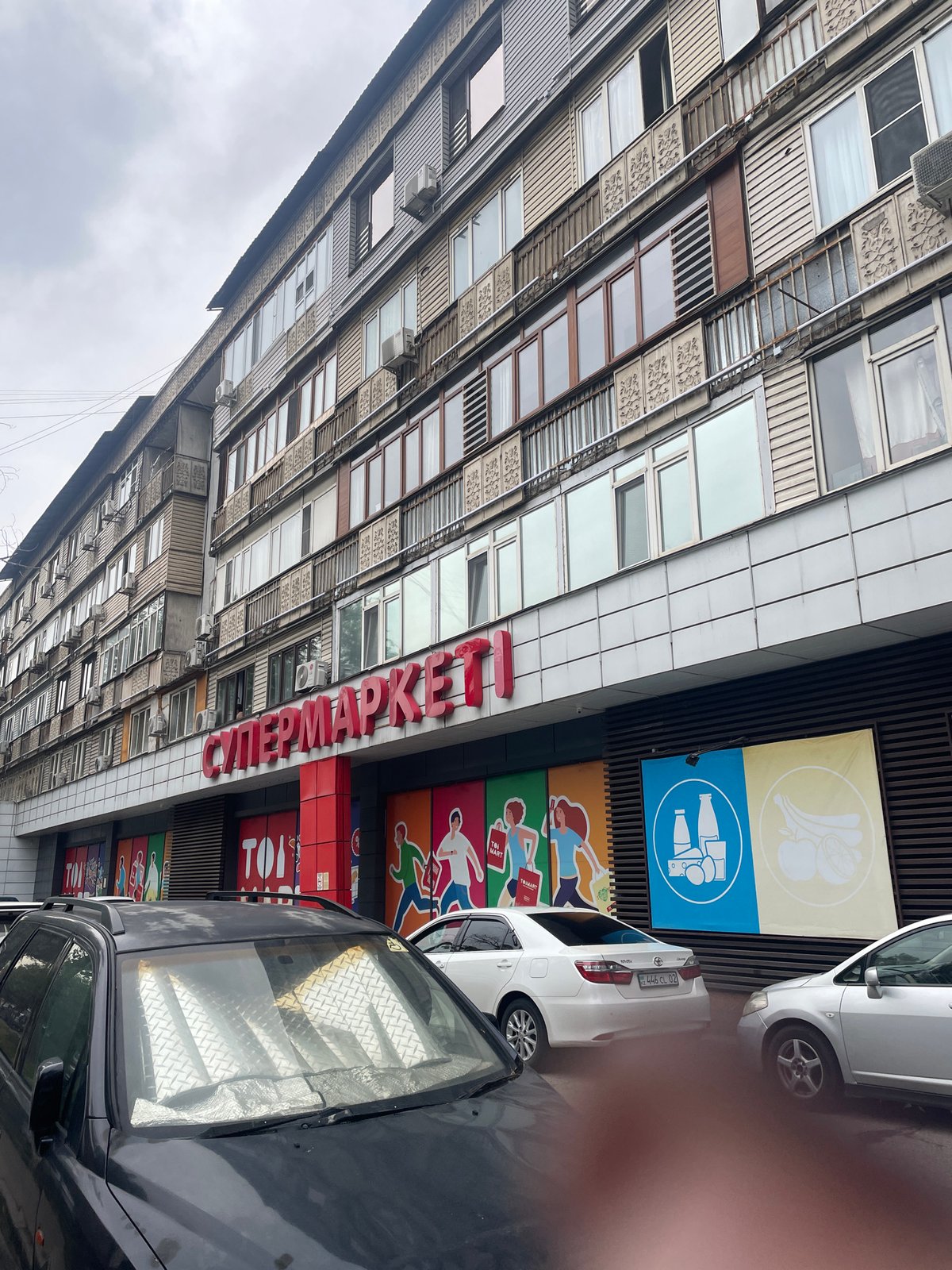 Everyday street scene in Almaty on a cloudy morning