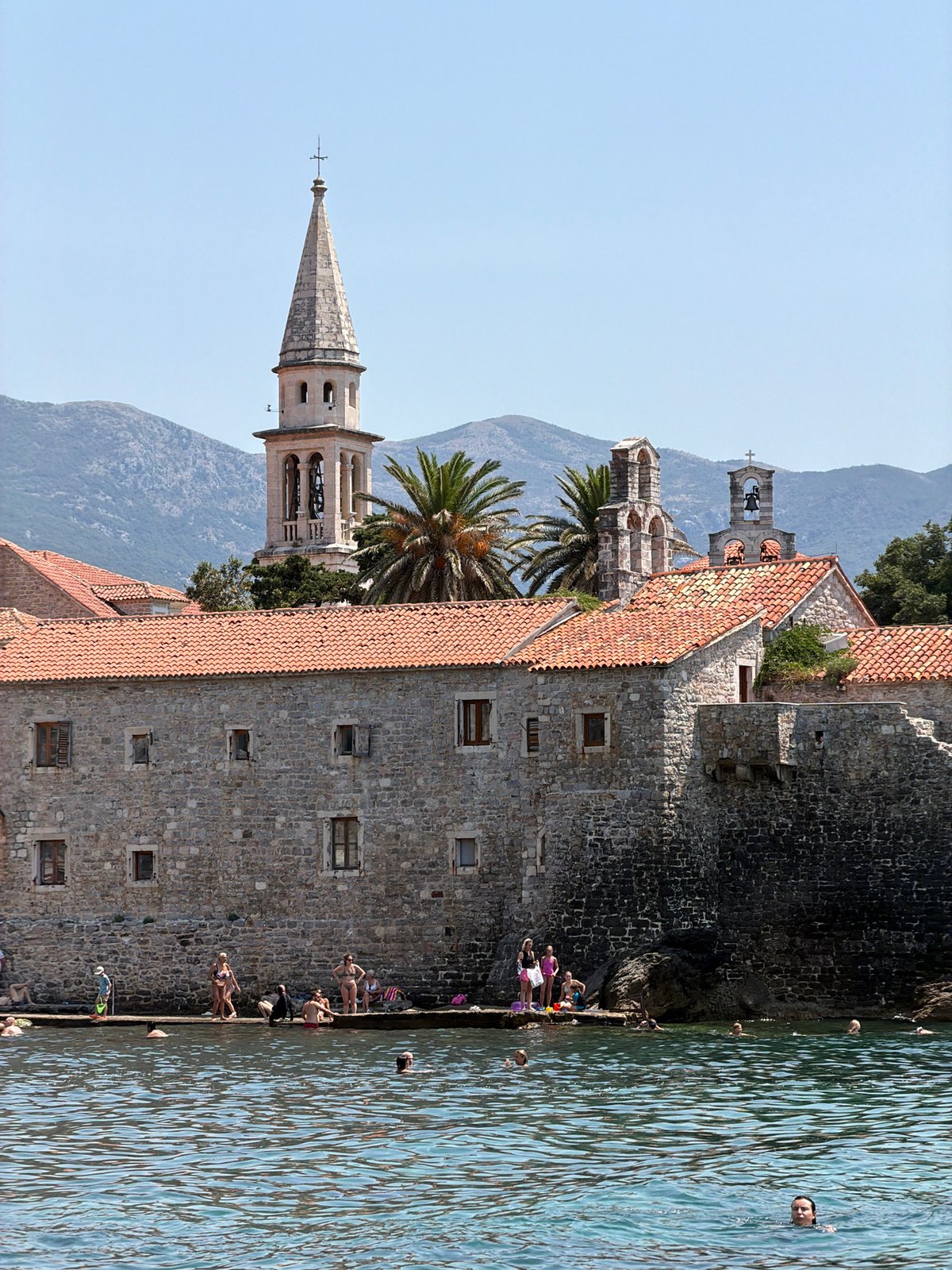 Swimming and boating off Budva's Adriatic coast