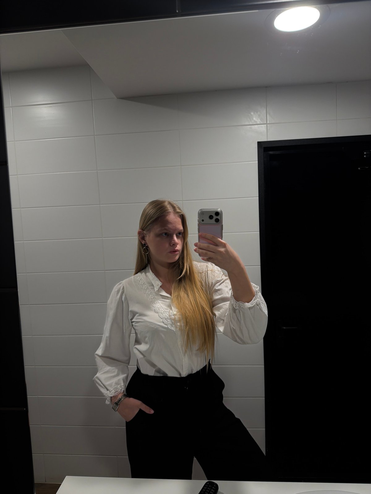 Woman takes morning mirror selfies in Izhevsk apartment