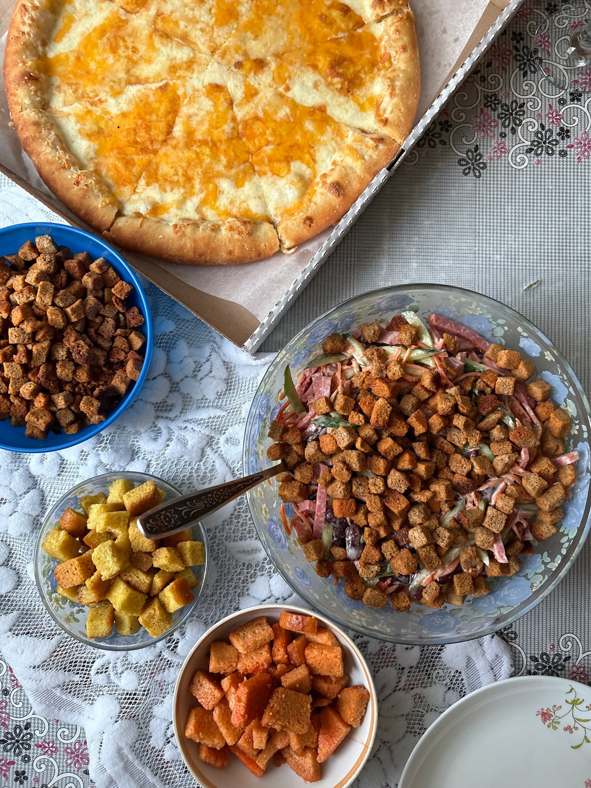 Meal documented with pizza, salad, beer in Ust-Ilimsk