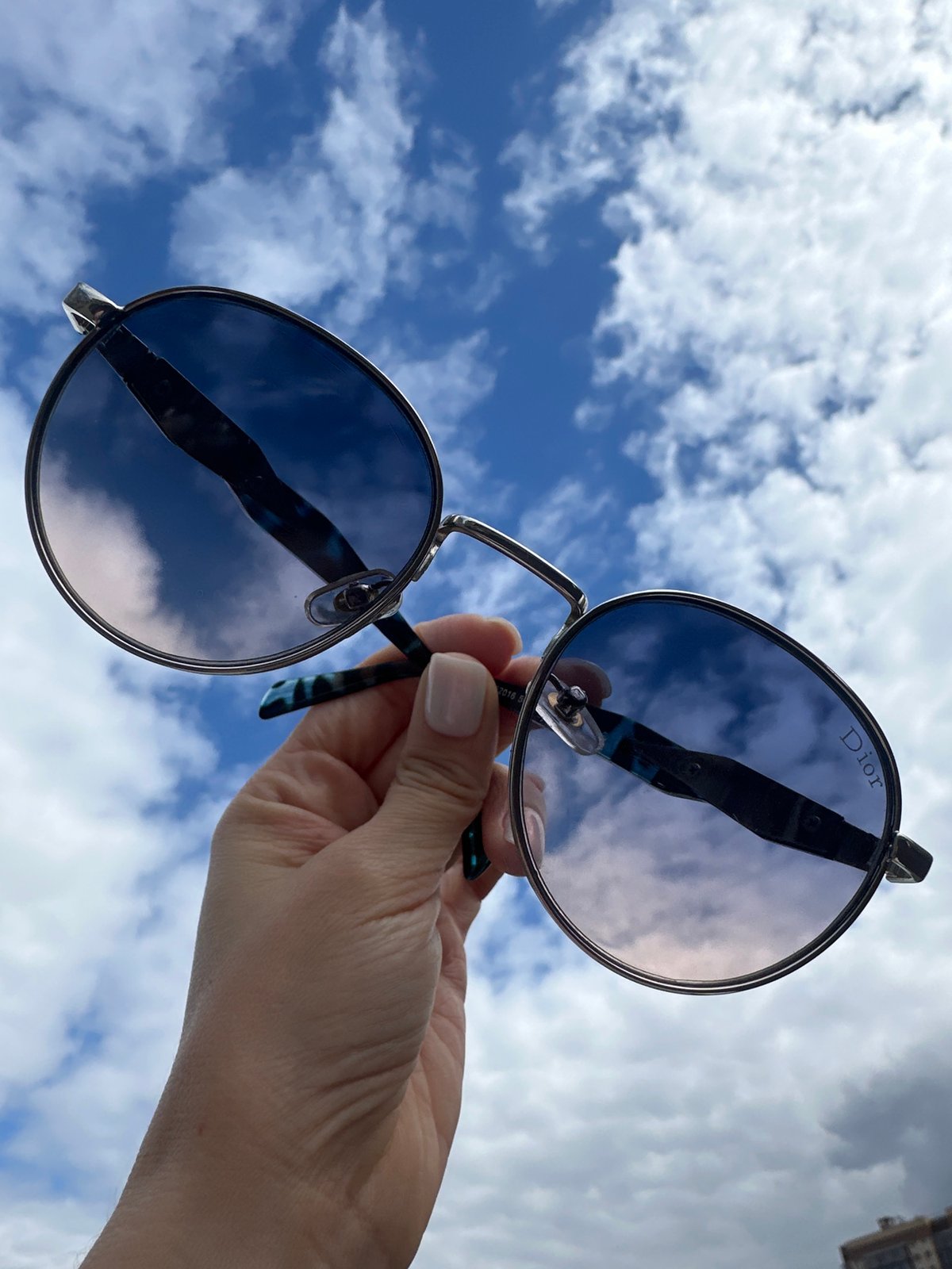 Spring morning photography session captures luxury sunglasses in Krasnoyarsk