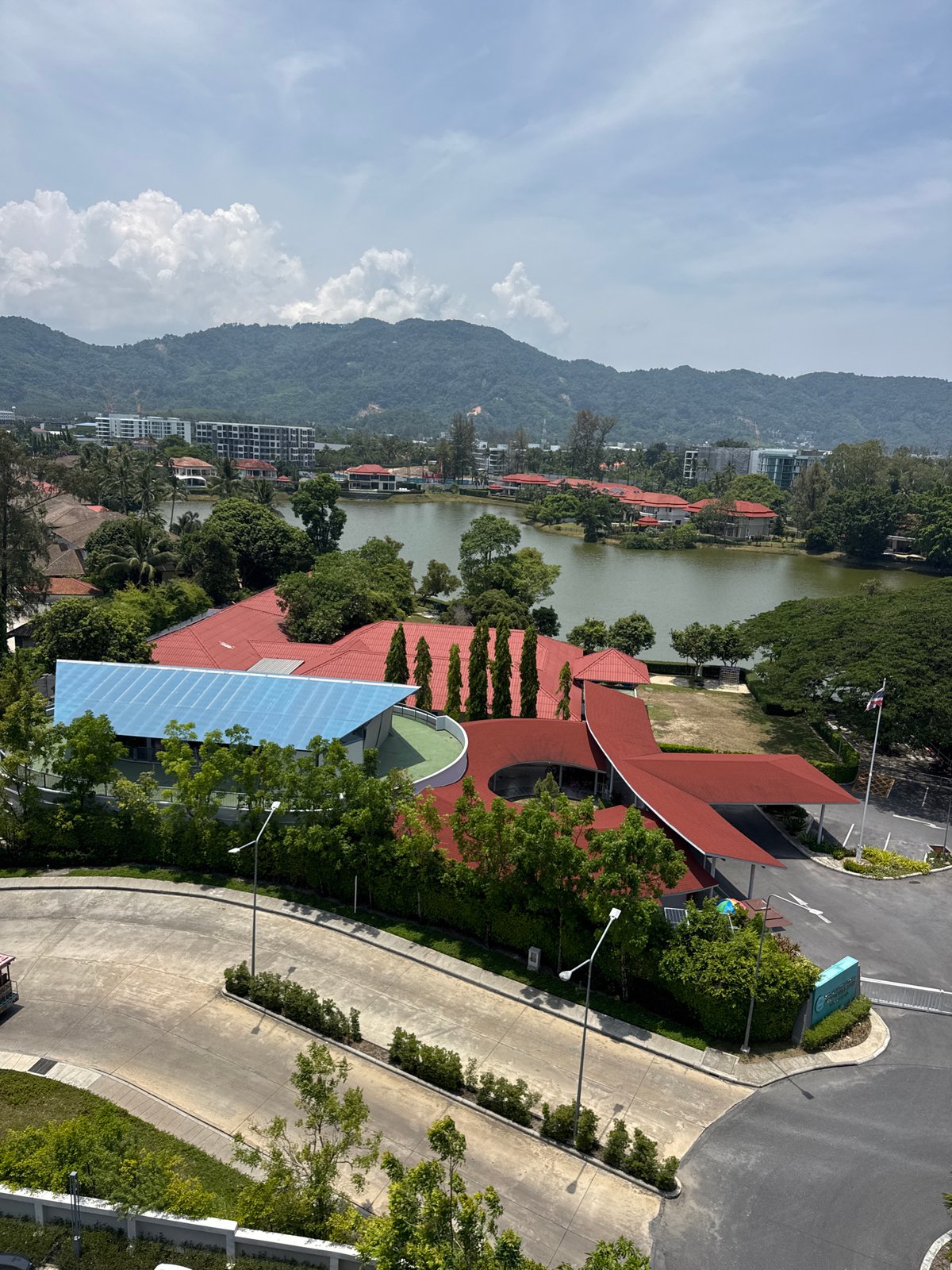 Aerial views capture Choeng Thale's lakeside homes and roundabout