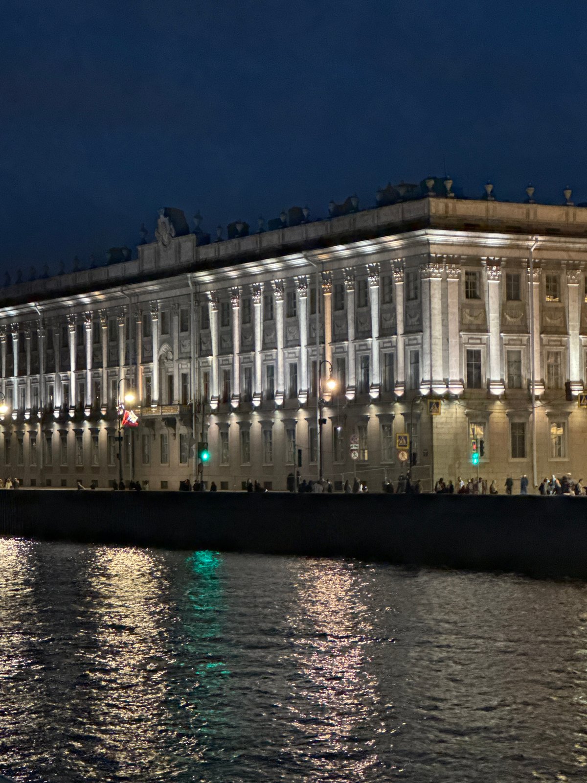 Saint Petersburg's illuminated waterfront captured during evening hours
