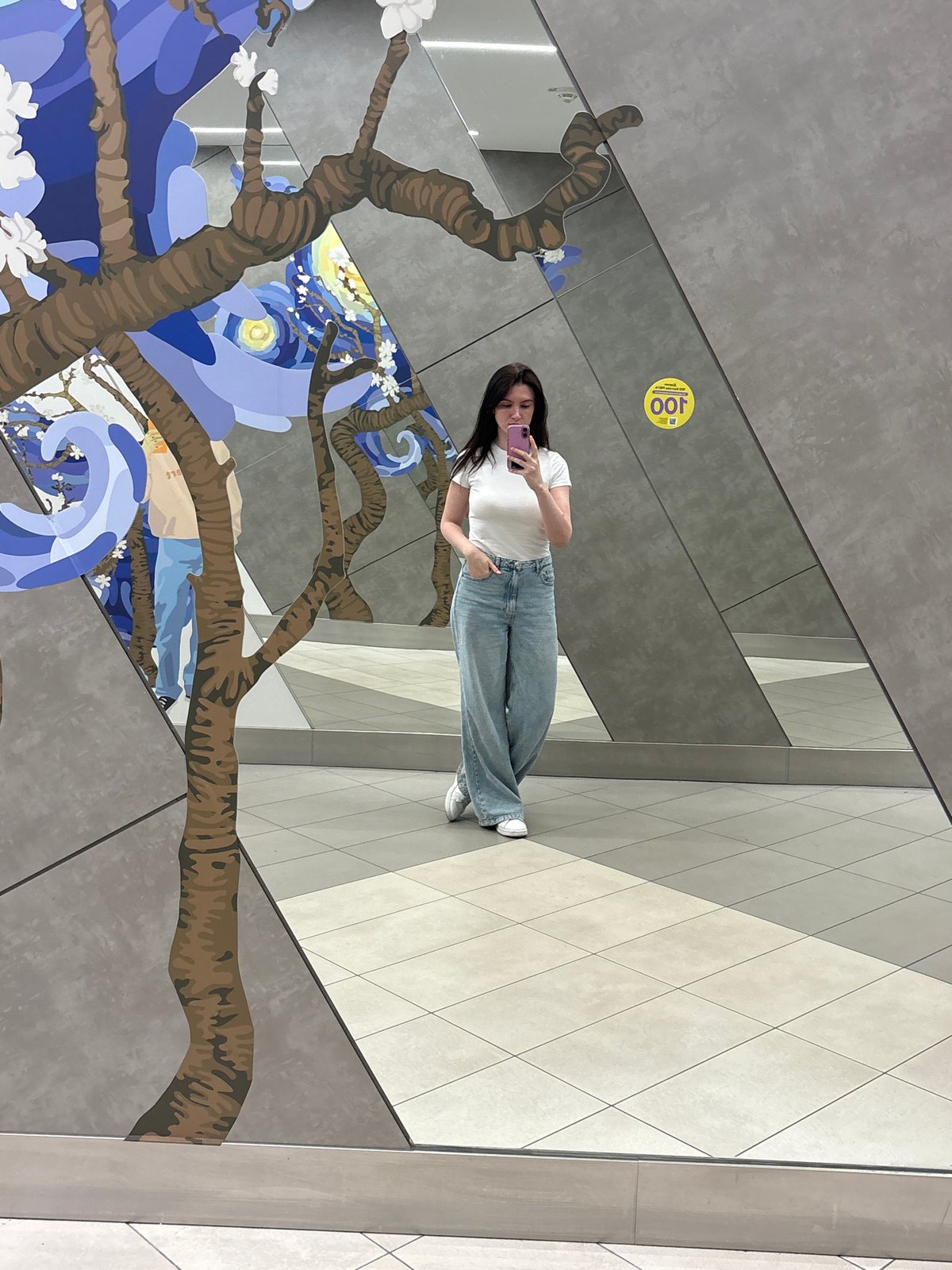 Woman takes selfie with Van Gogh-inspired art in Kazan