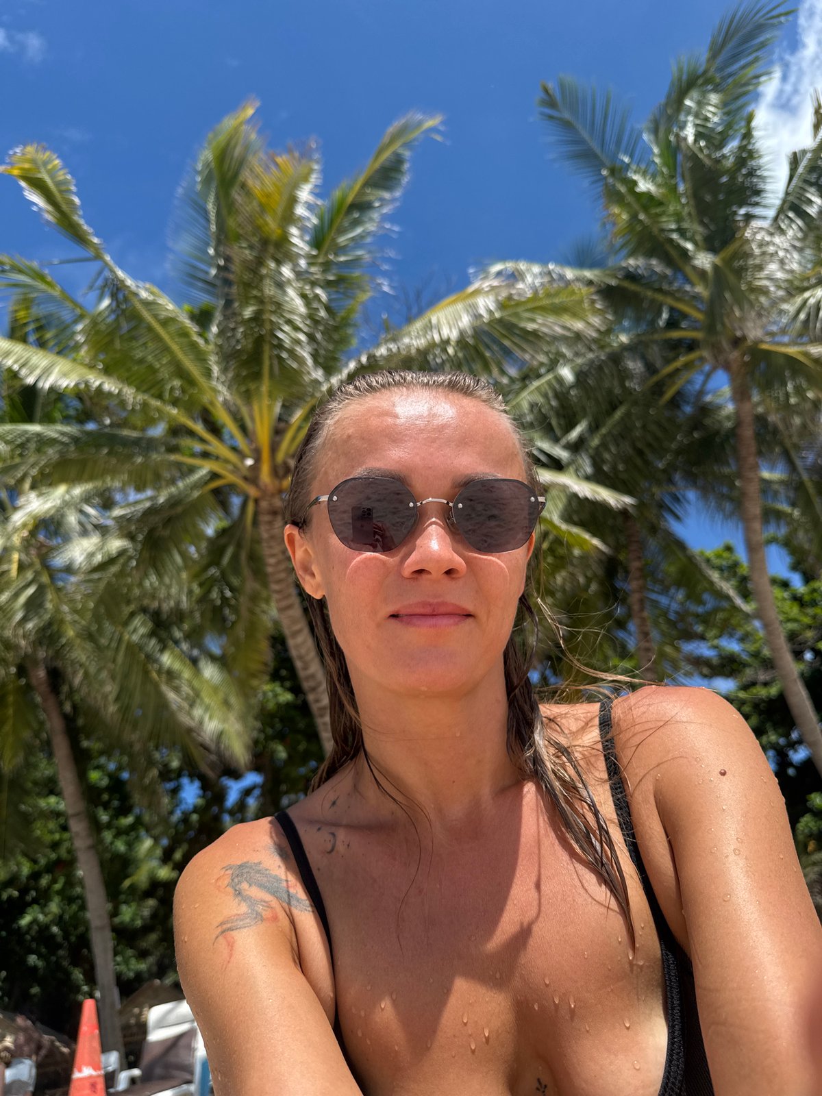 Sun, palms, and wet sand at Chaweng Noi beach