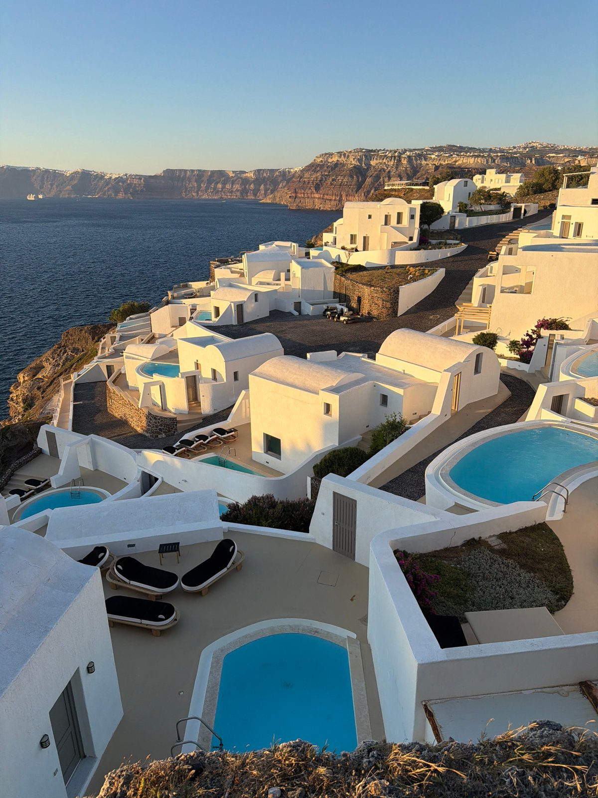 Clifftop moments over the Aegean in Santorini