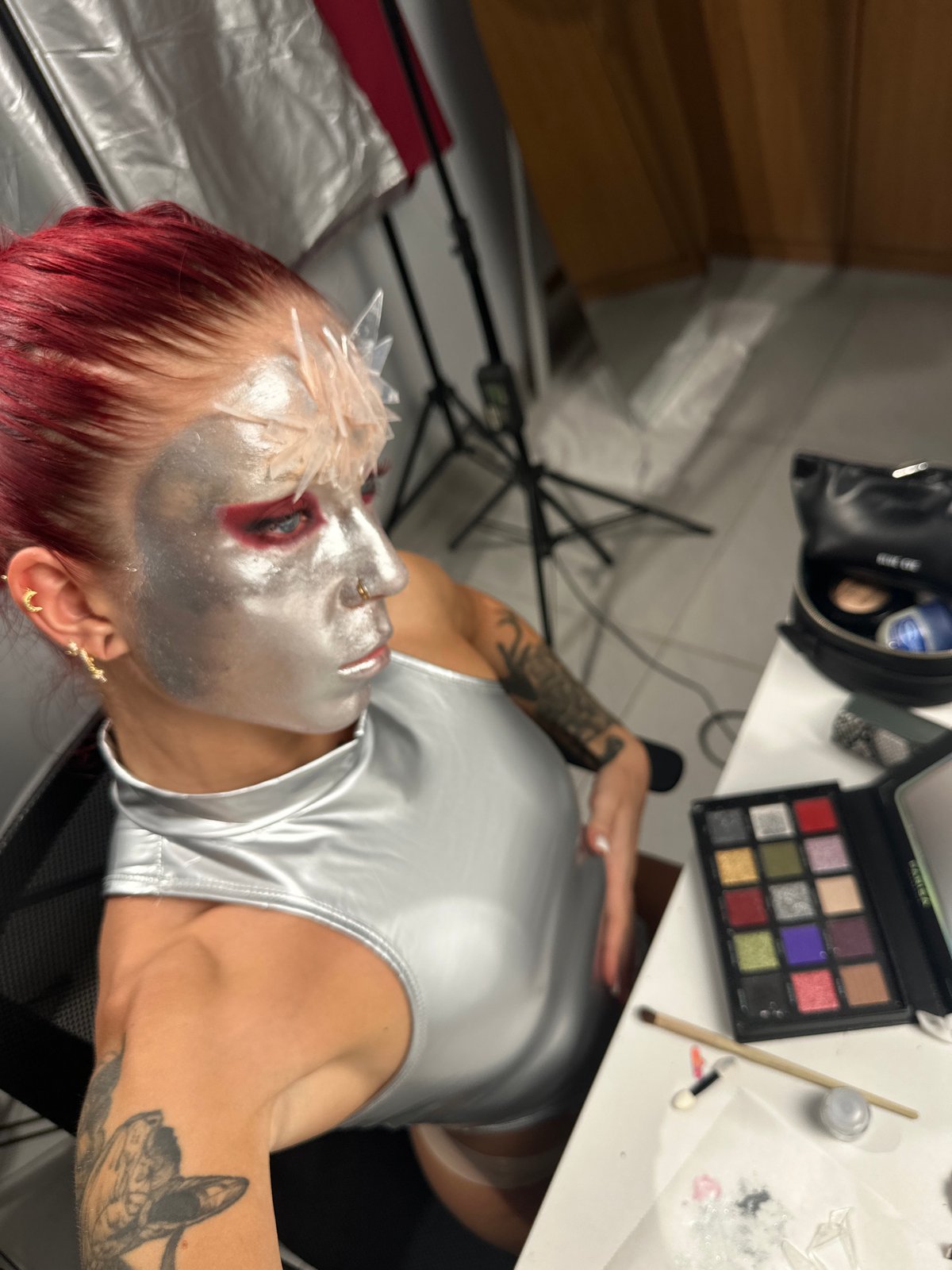 Elaborate silver makeup transformation with crystals in North Kuta