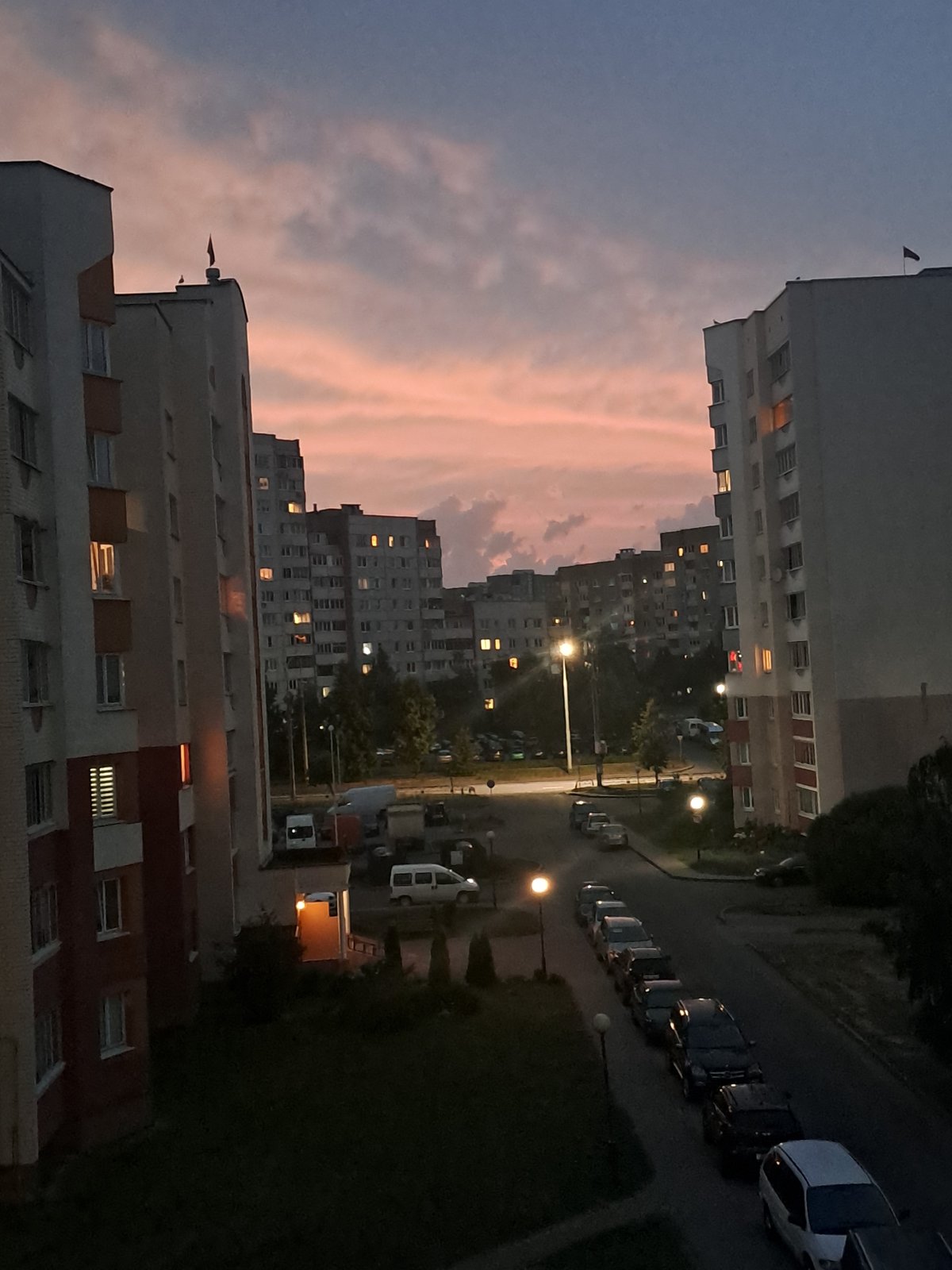 Dusk settles over Soviet-era apartment blocks in Hrodna