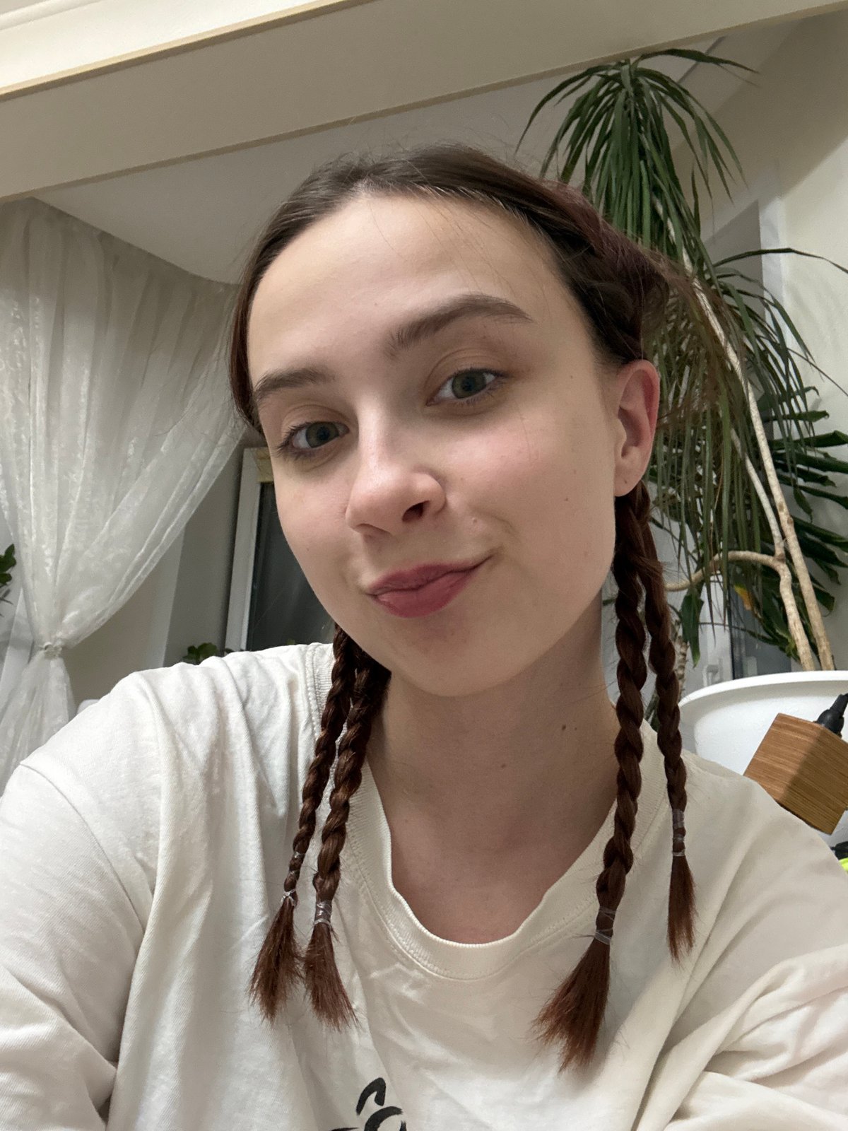 Woman photographed indoors in Vogulka, Russia
