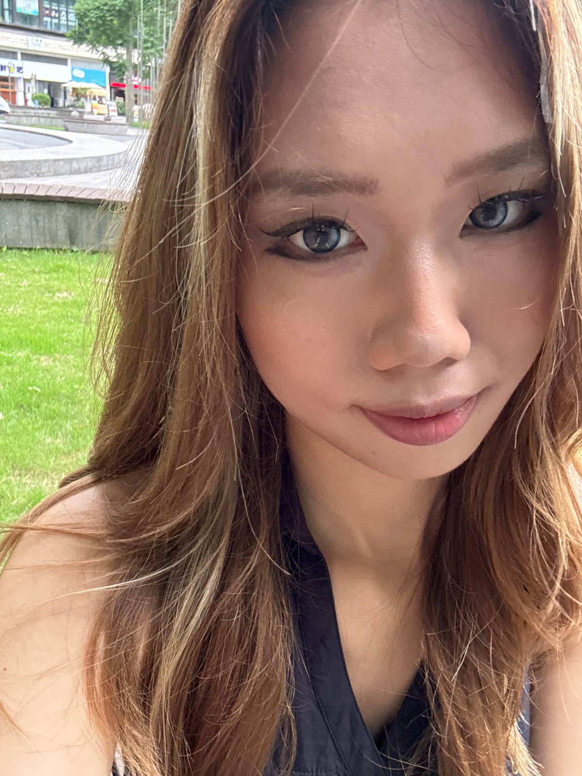 Selfie session at a modern urban park in Yuzhong District