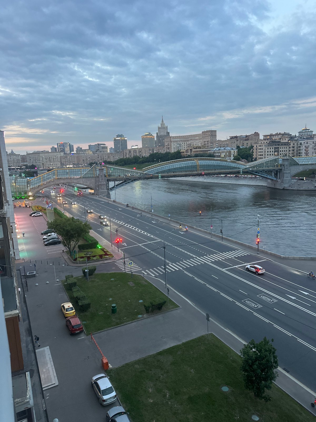 Moscow River at dusk, boats moving through the city